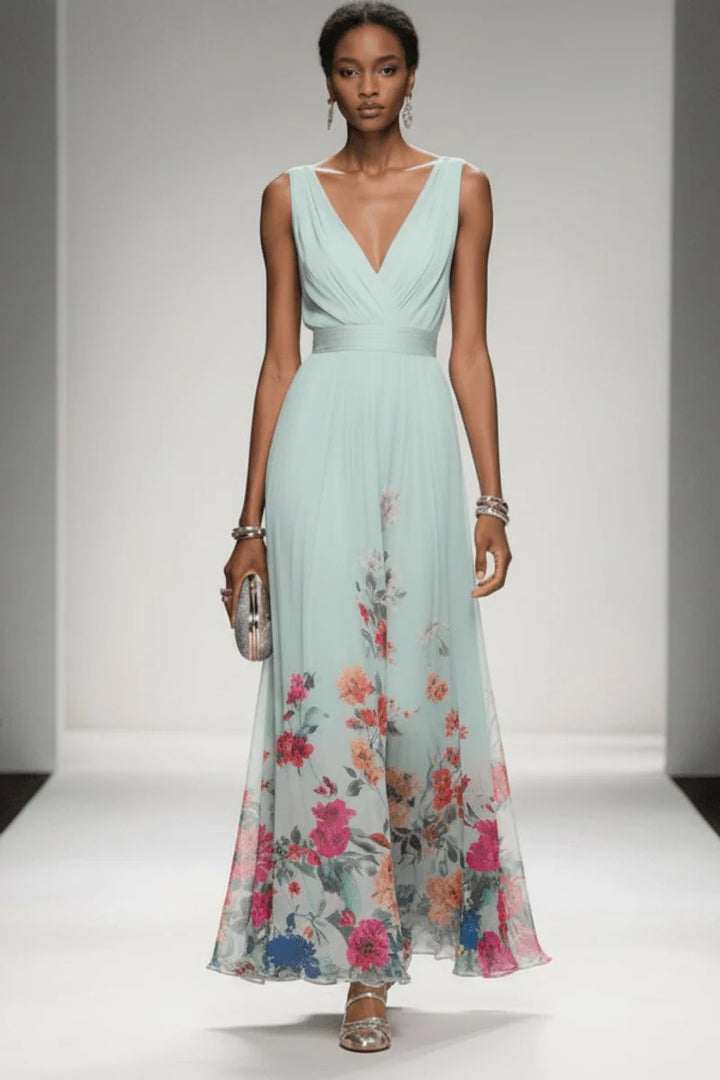 Floral chiffon maxi dress showing flowing A-line skirt and delicate watercolour print at hem