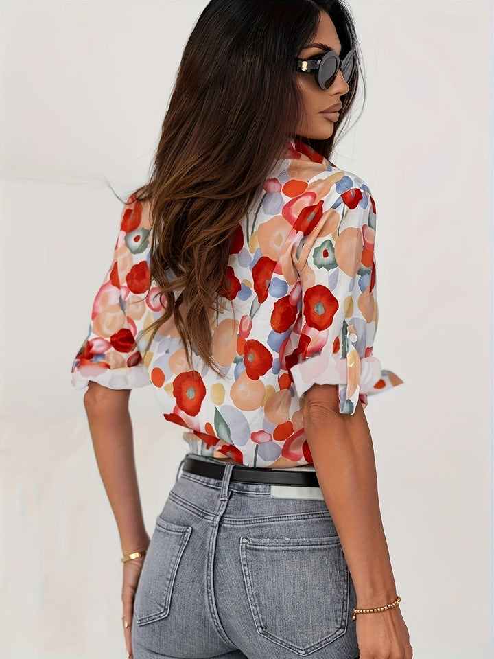 Side view of Women's Floral Print Long Sleeve Button-Up Shirt displaying relaxed regular fit and full-length sleeves