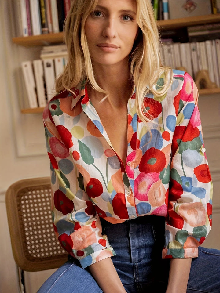 Women's Floral Print Long Sleeve Button-Up Shirt styled with dark denim showing versatile tucked-in look