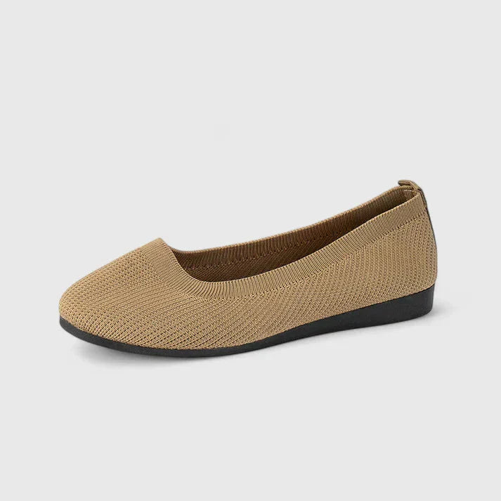 Women's orthopedic slip-on flats worn with casual outfit showing lightweight design and everyday versatility