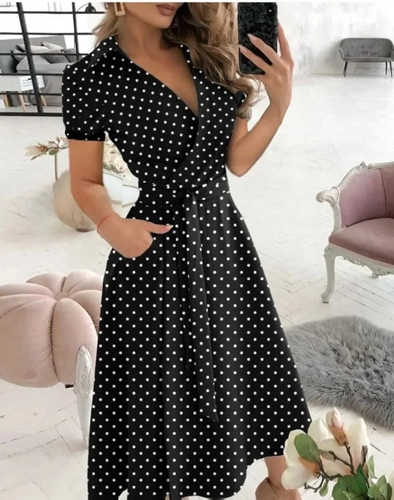 Full-length view of the A-line midi dress showing the flowing skirt and waist definition