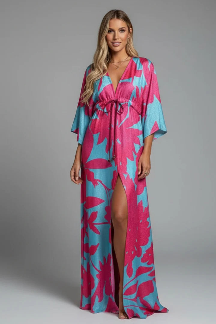 Holiday maxi dress in green and orange swirl print with button-front closure