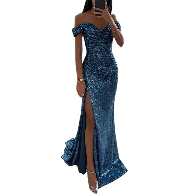 Sequin evening wedding guest dress showcasing off-shoulder design and elegant thigh-high slit