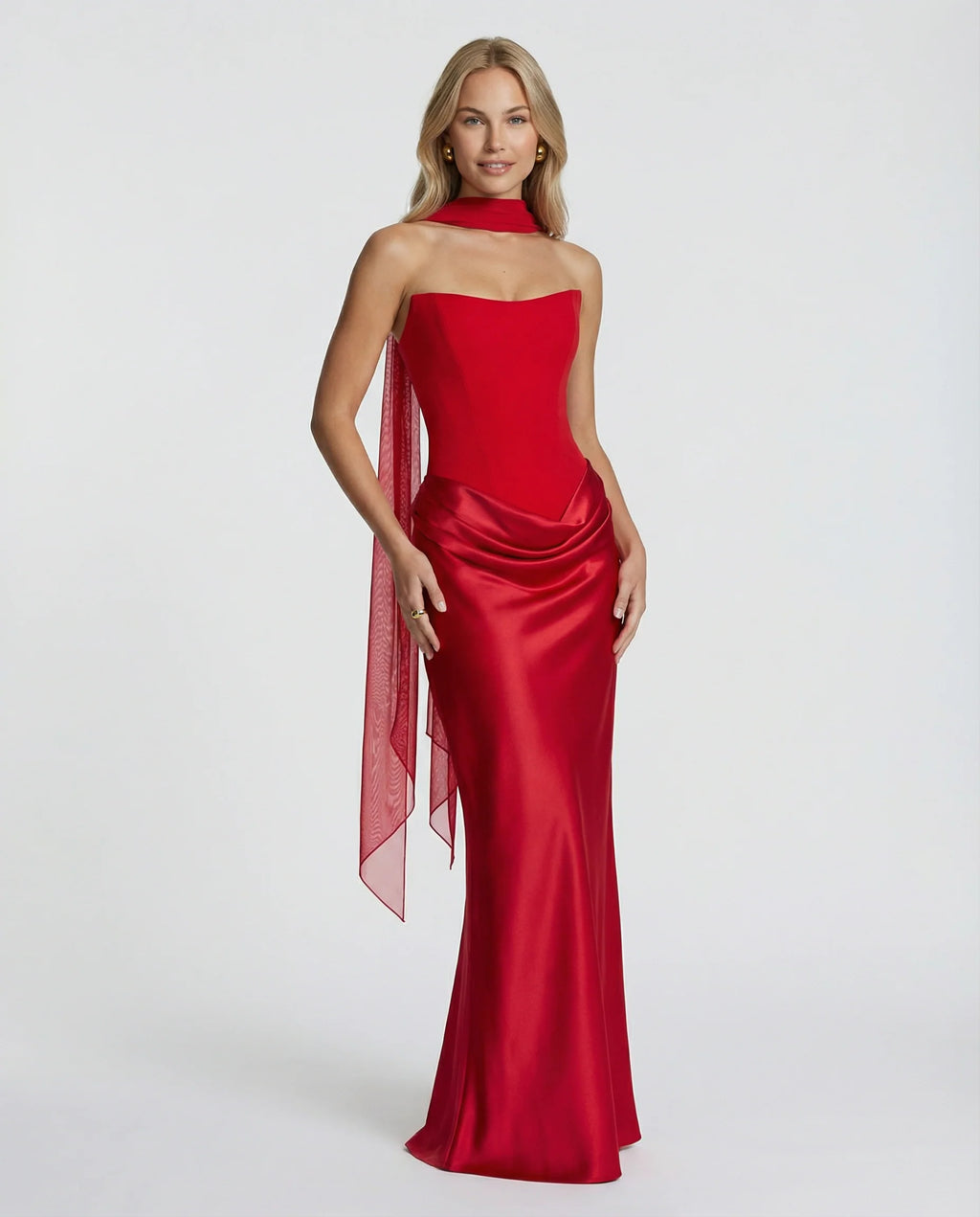 Black satin maxi dress styled for formal evening event with minimal accessories