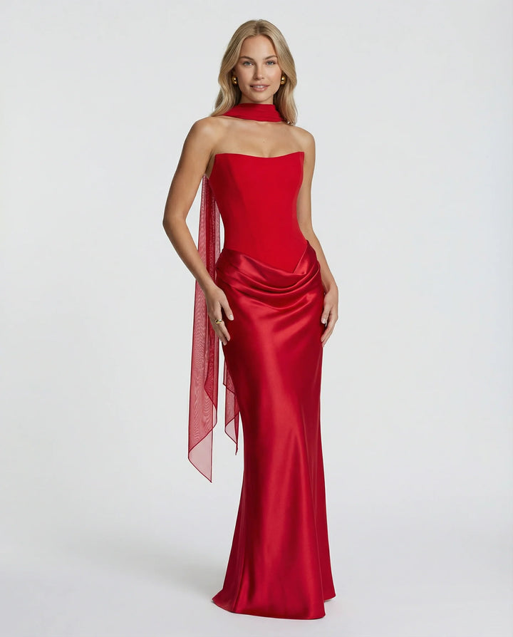 Black satin maxi dress styled for formal evening event with minimal accessories