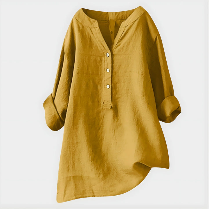 Elegant Cotton-Linen V-Neck Blouse styled for casual weekend wear with neutral bottoms