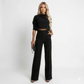 Chic Two-Piece Set For Women featuring a cropped long sleeve top and high-waist straight-leg trousers in black