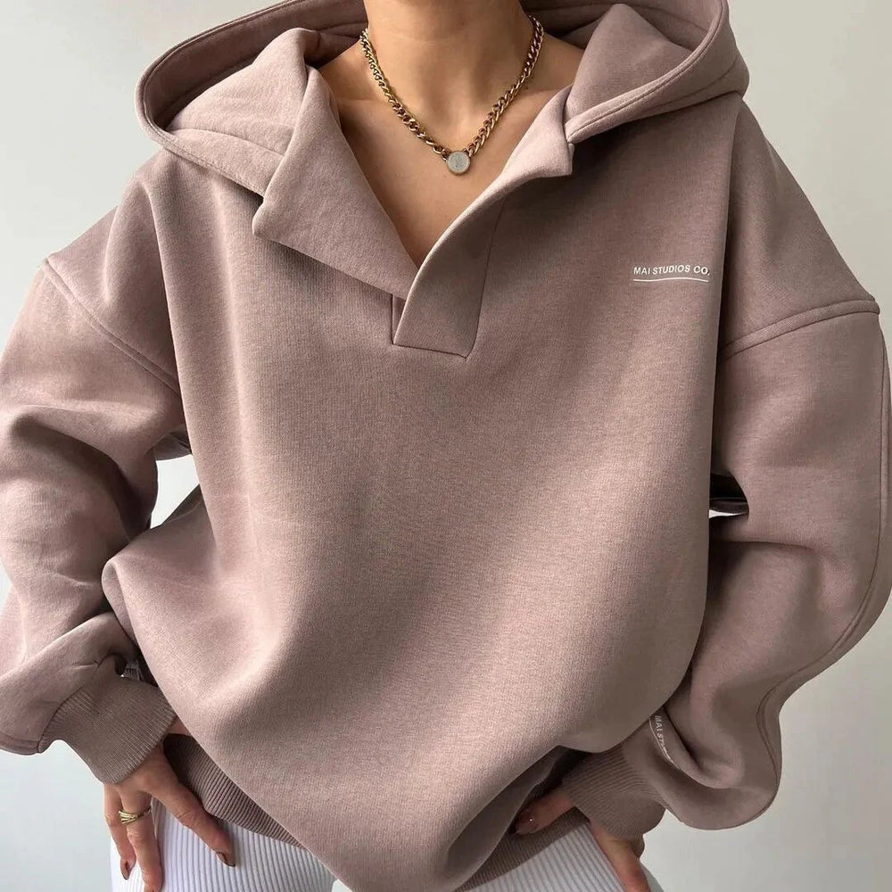 Close-up view of the Women's Oversized Lounge Hoodie showing soft fleece fabric and relaxed fit silhouette