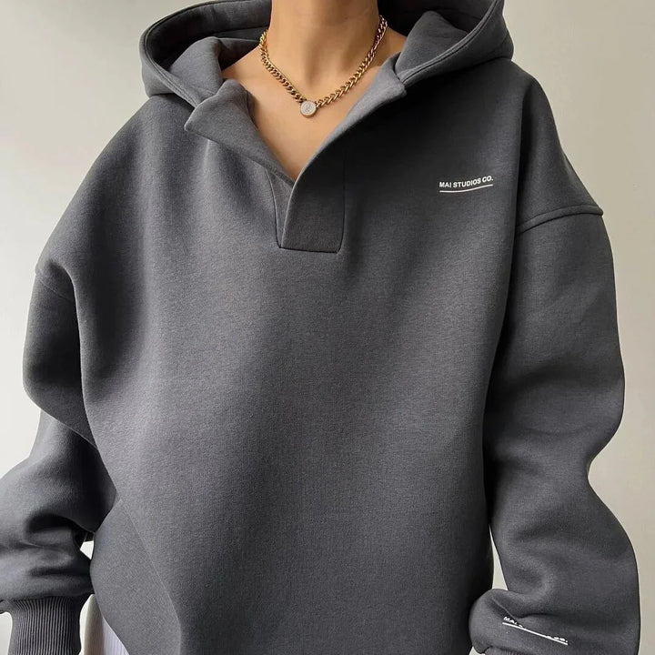 Full-length shot of the Women's Oversized Lounge Hoodie styled with casual bottoms for everyday wear
