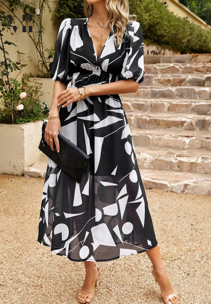 Floral midi dress styled with sandals for daytime casual look