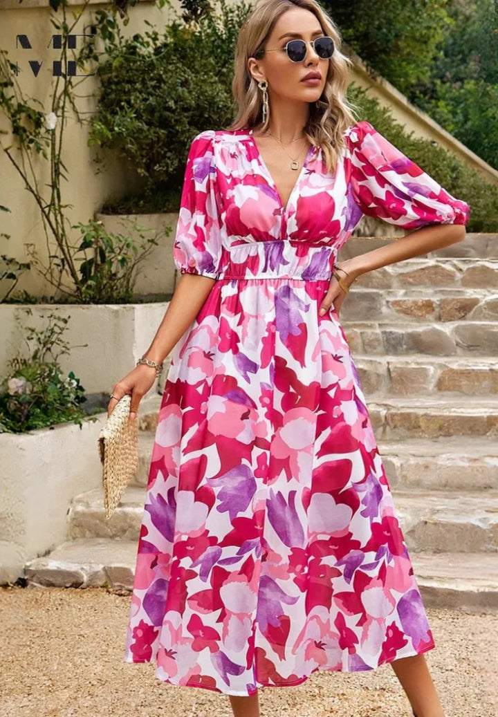 Woman in V-neck floral midi dress with statement accessories