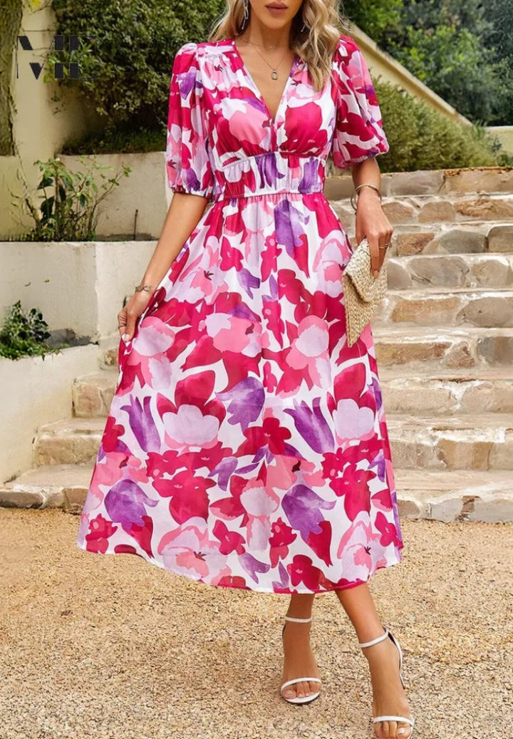 Full outfit view of women's A-line midi dress with floral print