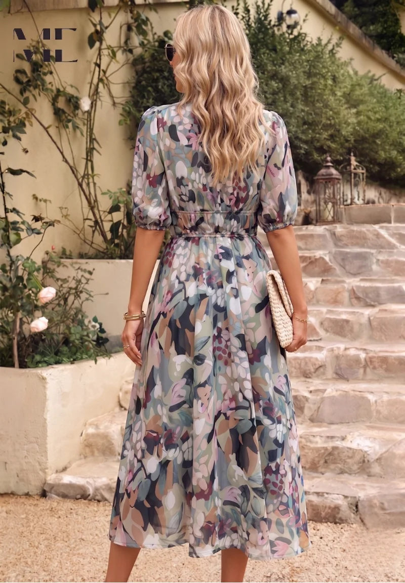 Close-up view of V-neckline and gathered puff sleeves on floral midi dress