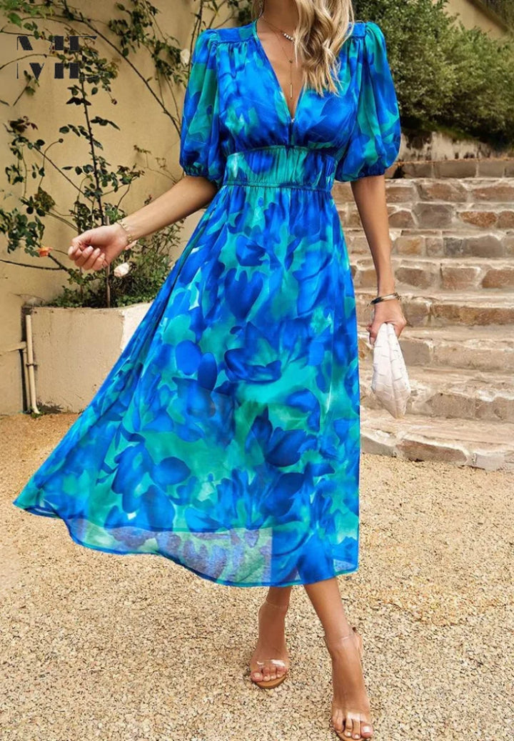 Woman styling floral A-line midi dress with accessories for casual wear