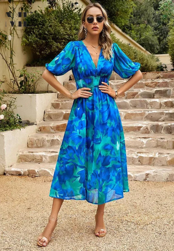 Full-length view of women's midi dress with abstract floral print