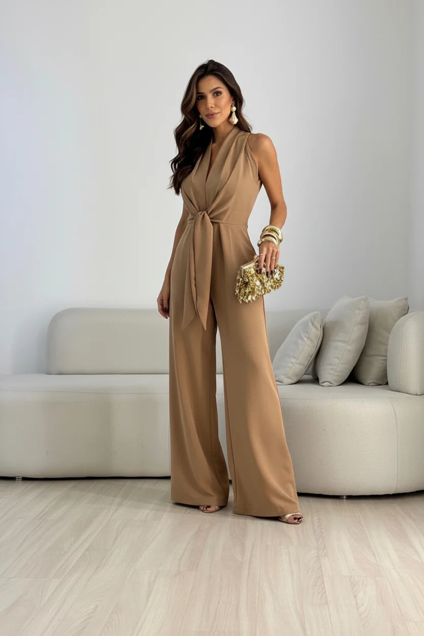 Sleeveless halterneck jumpsuit showing flowing wide-leg trousers and fitted bodice