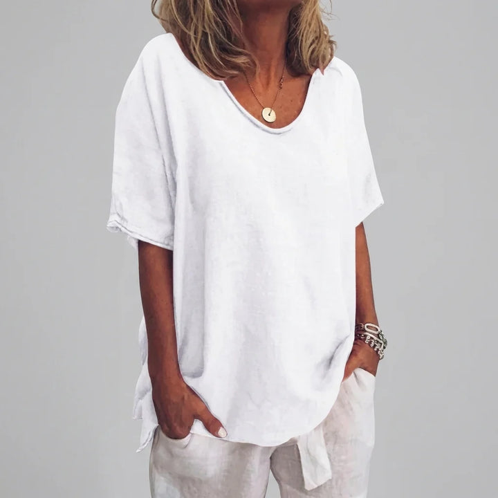Detail shot of v-neckline and short sleeves on women's relaxed summer tee