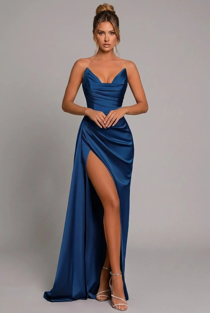Full-length view of maxi formal dress with dramatic thigh-high slit and flowing skirt