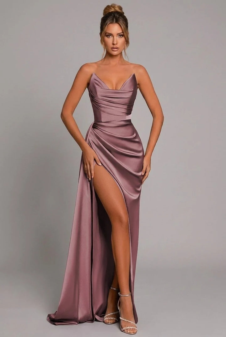 Detail of ruched bodice and smooth satin finish on strapless formal dress