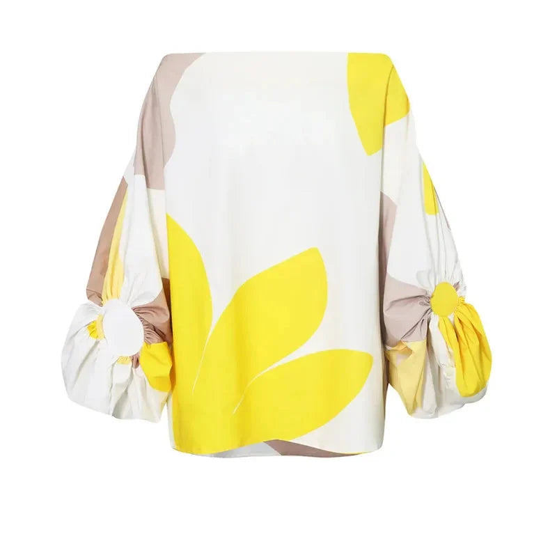 Front view of wrap midi dress highlighting asymmetric neckline and balloon sleeves