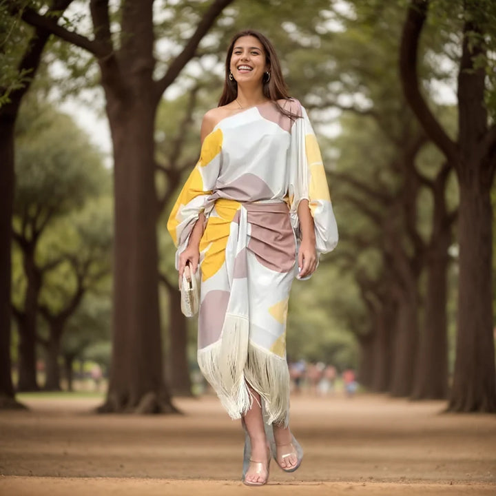 Side angle of wrap midi dress featuring asymmetric neckline and adjustable tie closure