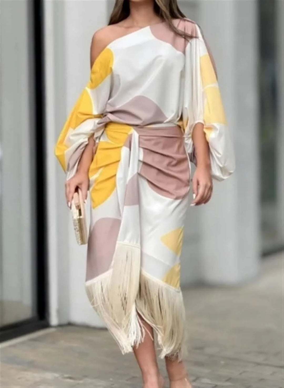 Woman styling one shoulder wrap dress with strappy sandals for daytime wear
