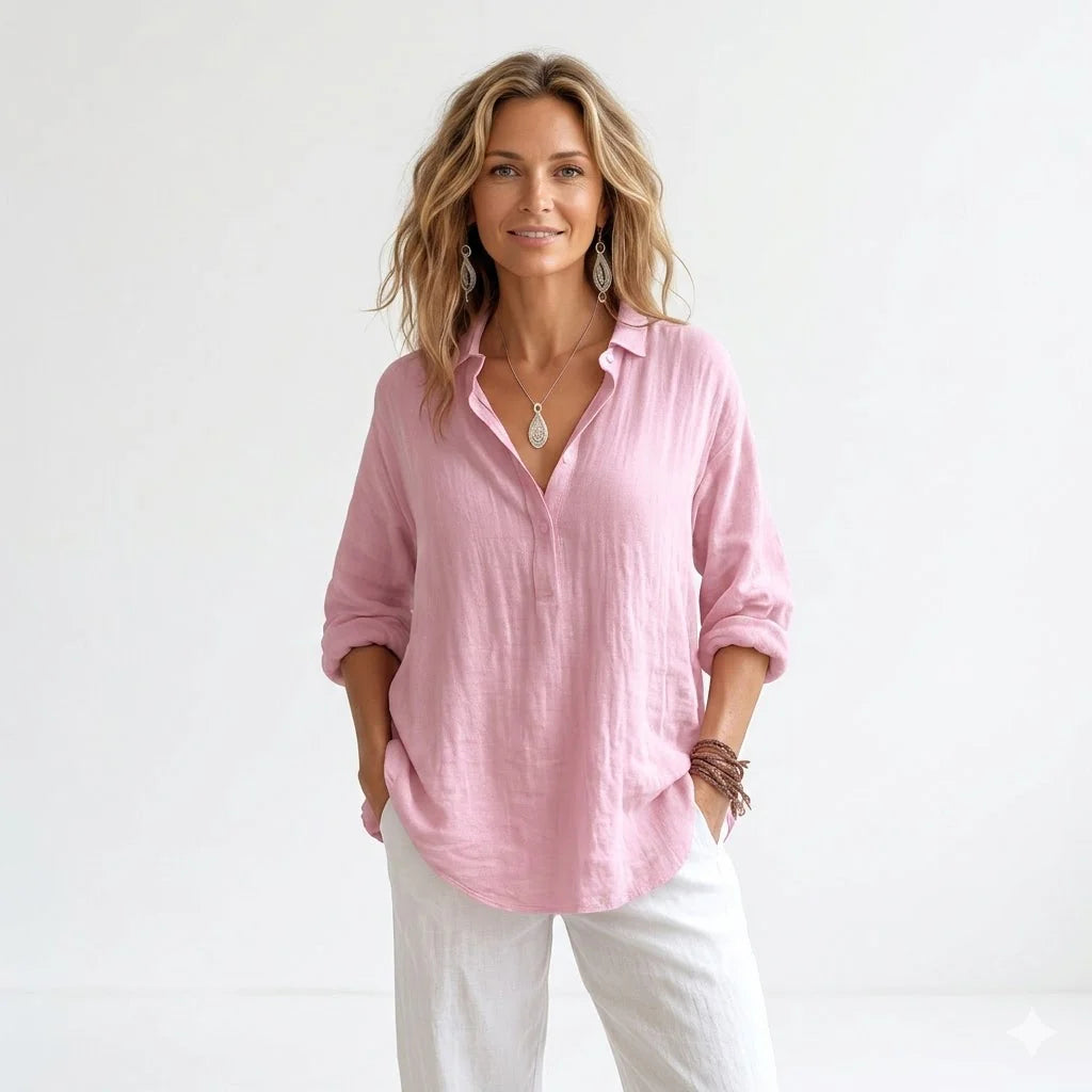 Woman wearing Blush Linen Relaxed Shirt with Effortless Elegance For Women in soft pink with V-neckline and long sleeves