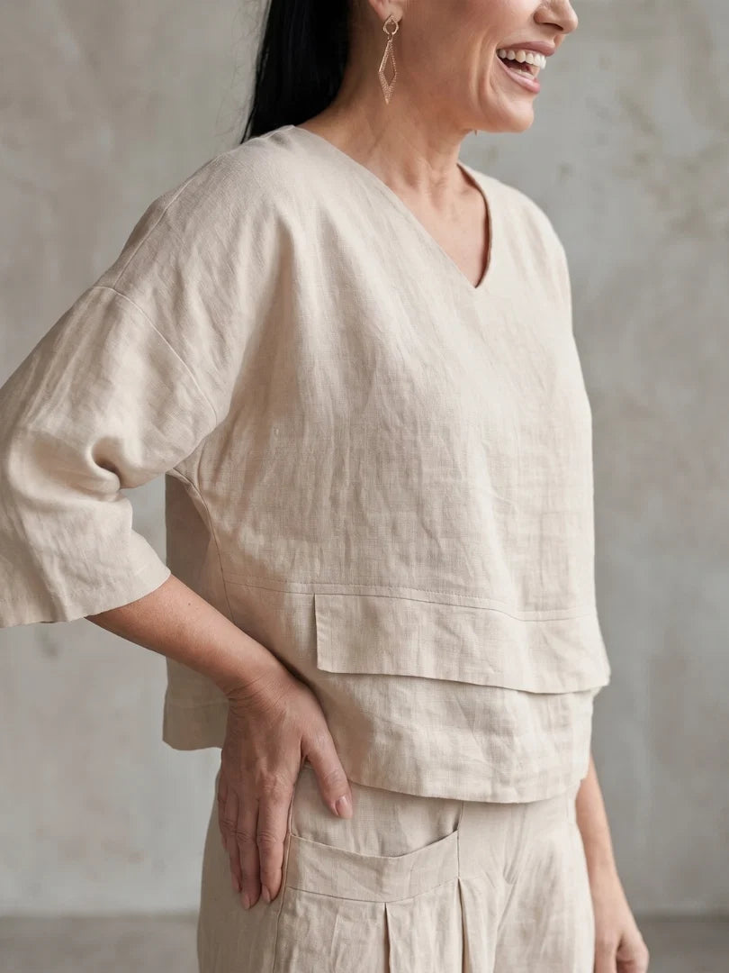 Women's casual two piece outfit with wide leg silhouette and cropped layered top