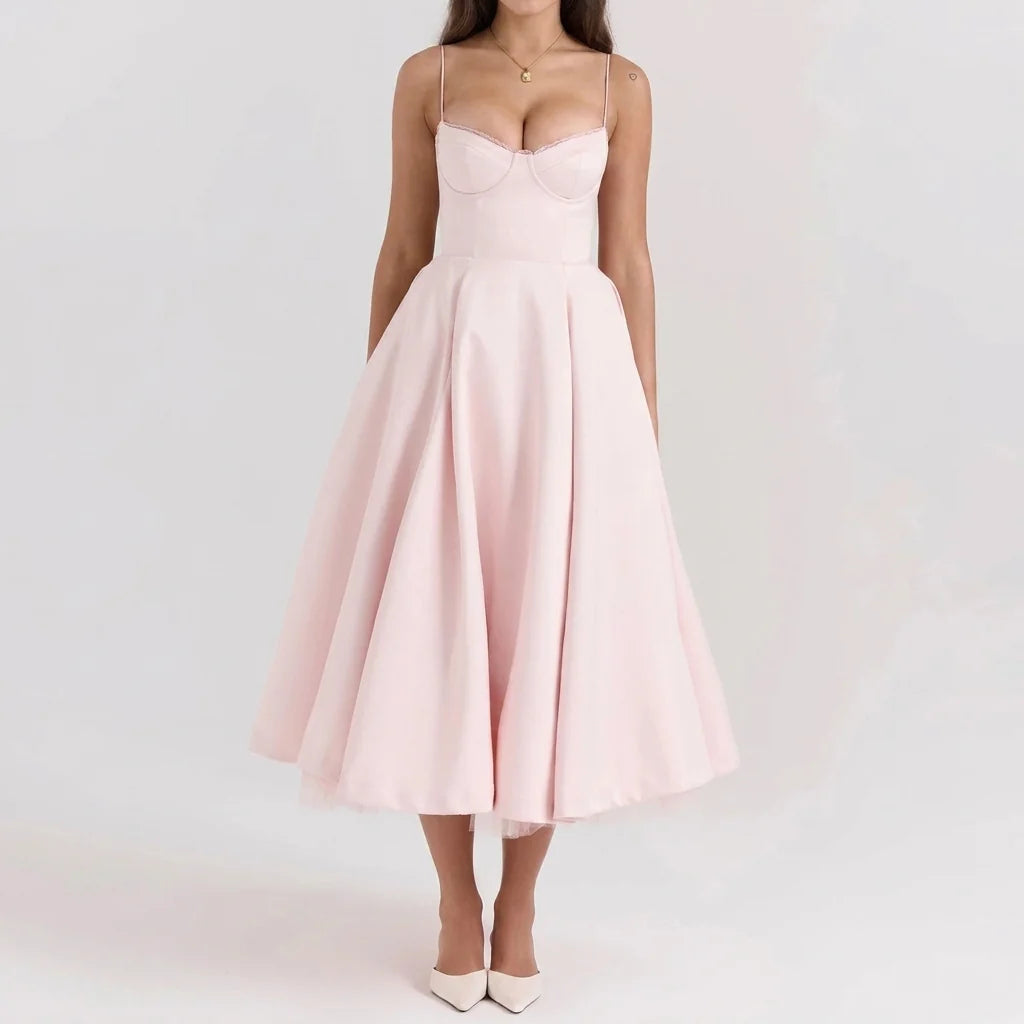 Back detail of corset midi dress with hidden zip closure and flowing skirt