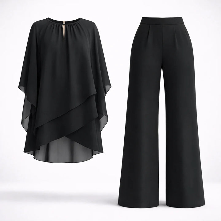 Layered two-piece set for women featuring flowing overlay top with keyhole neckline and wide-leg trousers in black