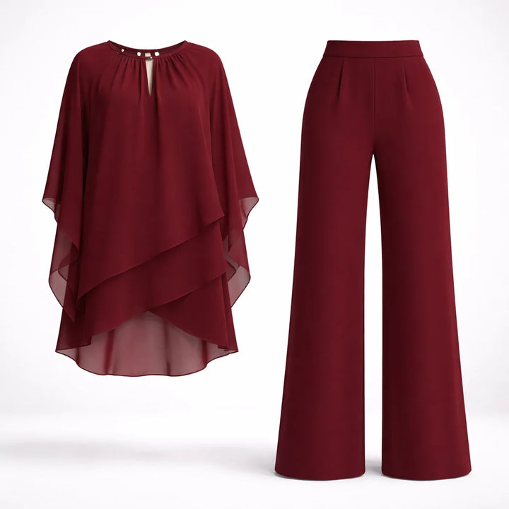 Formal two-piece set with semi-sheer overlay top and high-waisted wide-leg trousers for evening wear