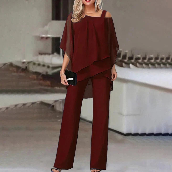 Flowing layered top and wide-leg trousers set for women in coordinated black fabric
