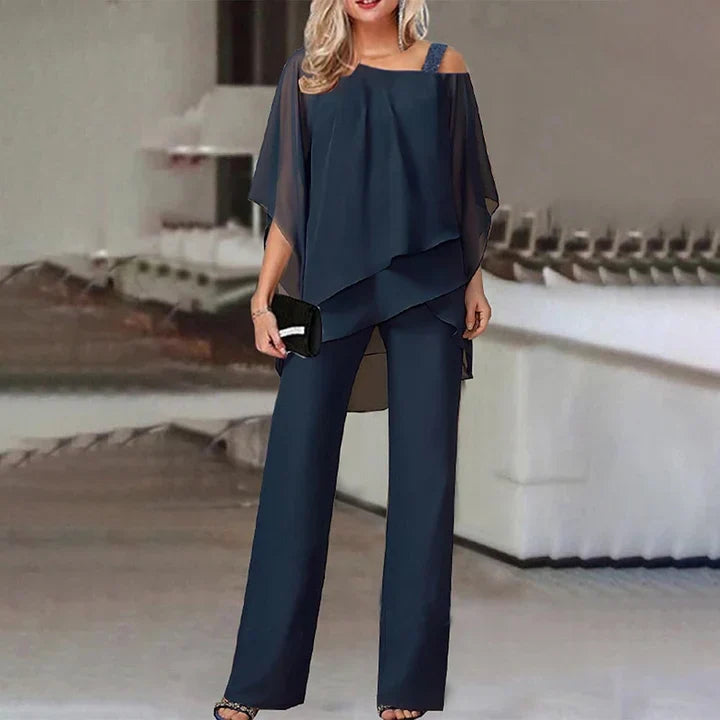 Layered two-piece set featuring keyhole neckline top and wide-leg trousers for formal events