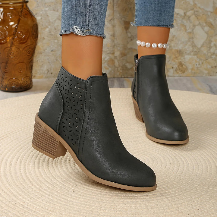 Women's ankle boots cutout detail paired with casual outfit for transitional season styling