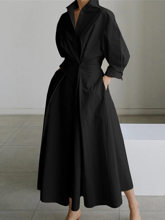Back view of beige midi dress with structured collar and belt tie
