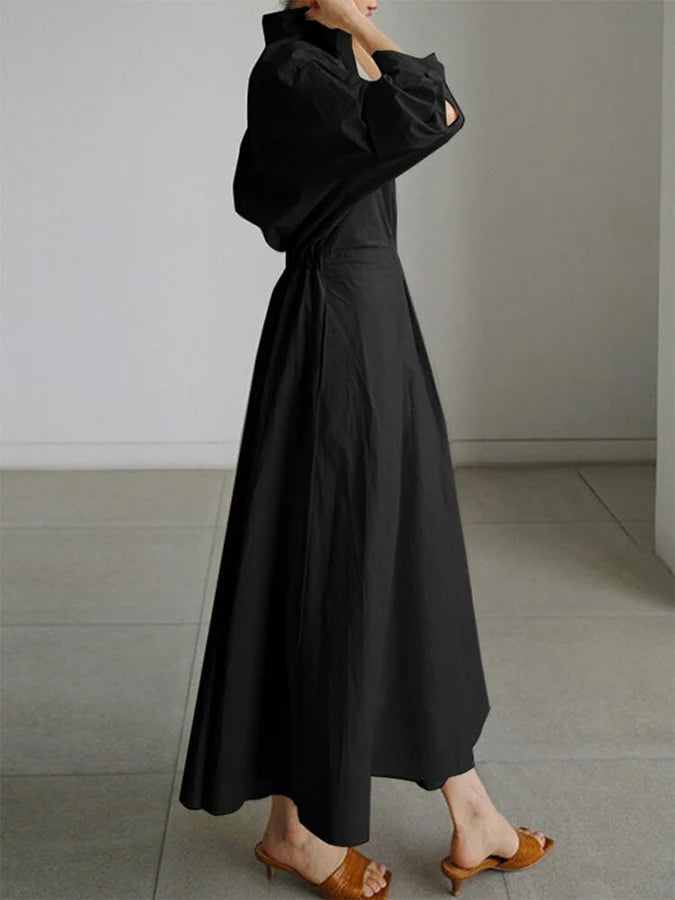 Detail of 3/4 sleeves and collar on A-line midi dress