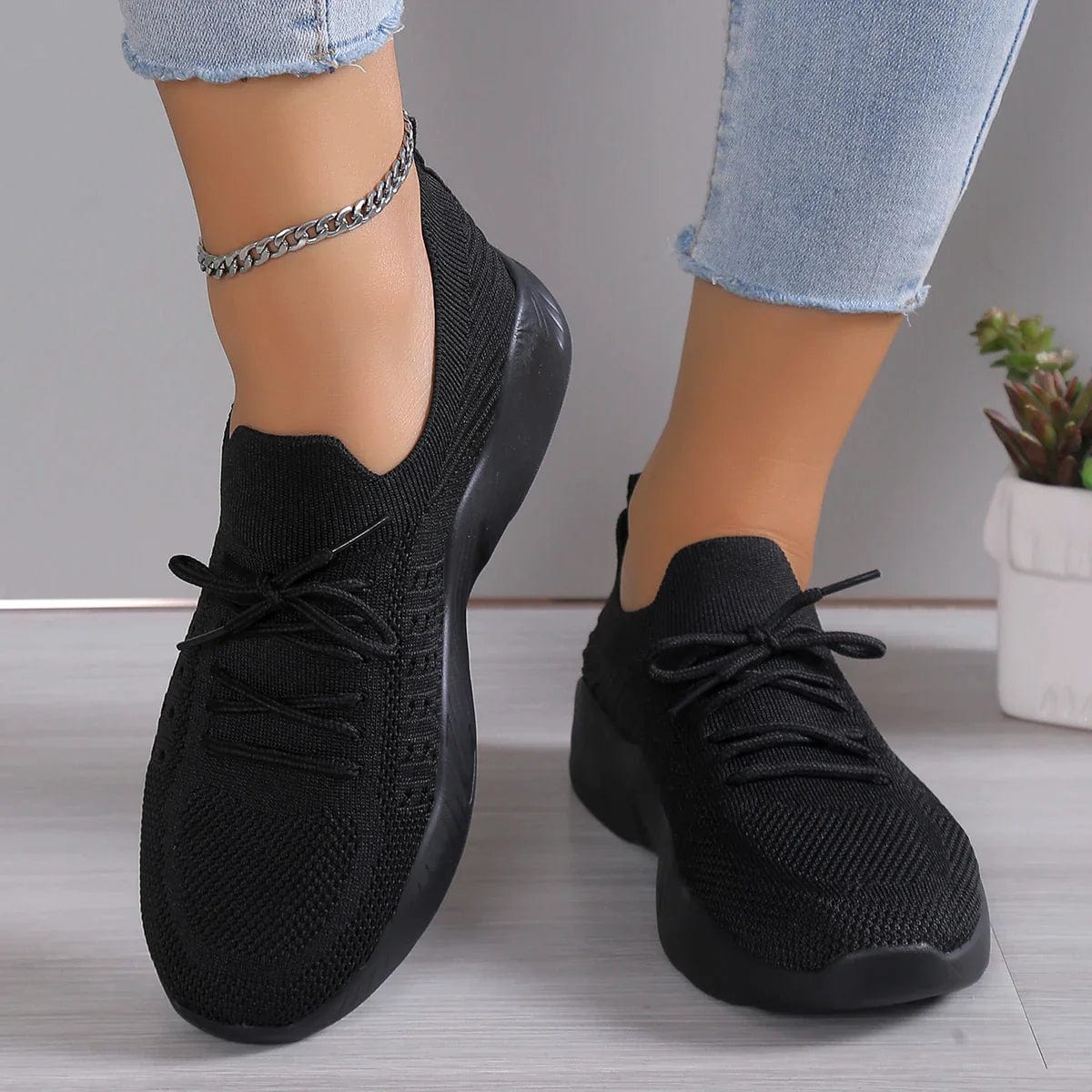 Side angle of casual comfort shoes showing arch support structure and wave-pattern tread