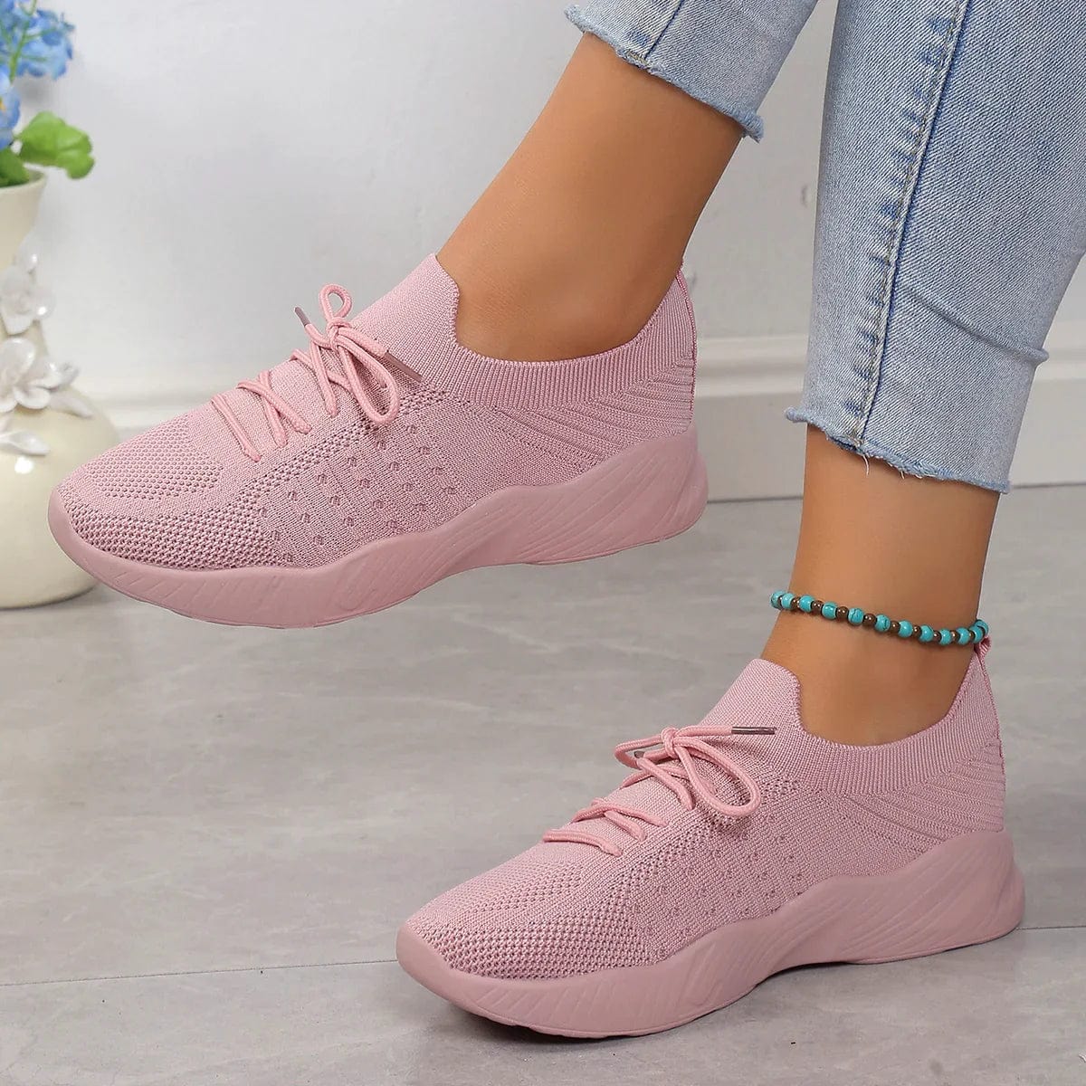 Side view of women's orthopedic comfort shoes with wave-pattern rubber sole and cushioned midsole