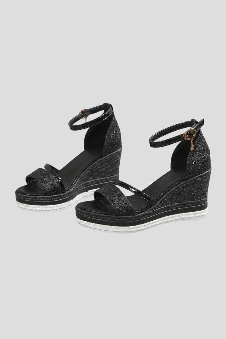 Women's wedge sandals with ankle strap and espadrille platform in textured black finish