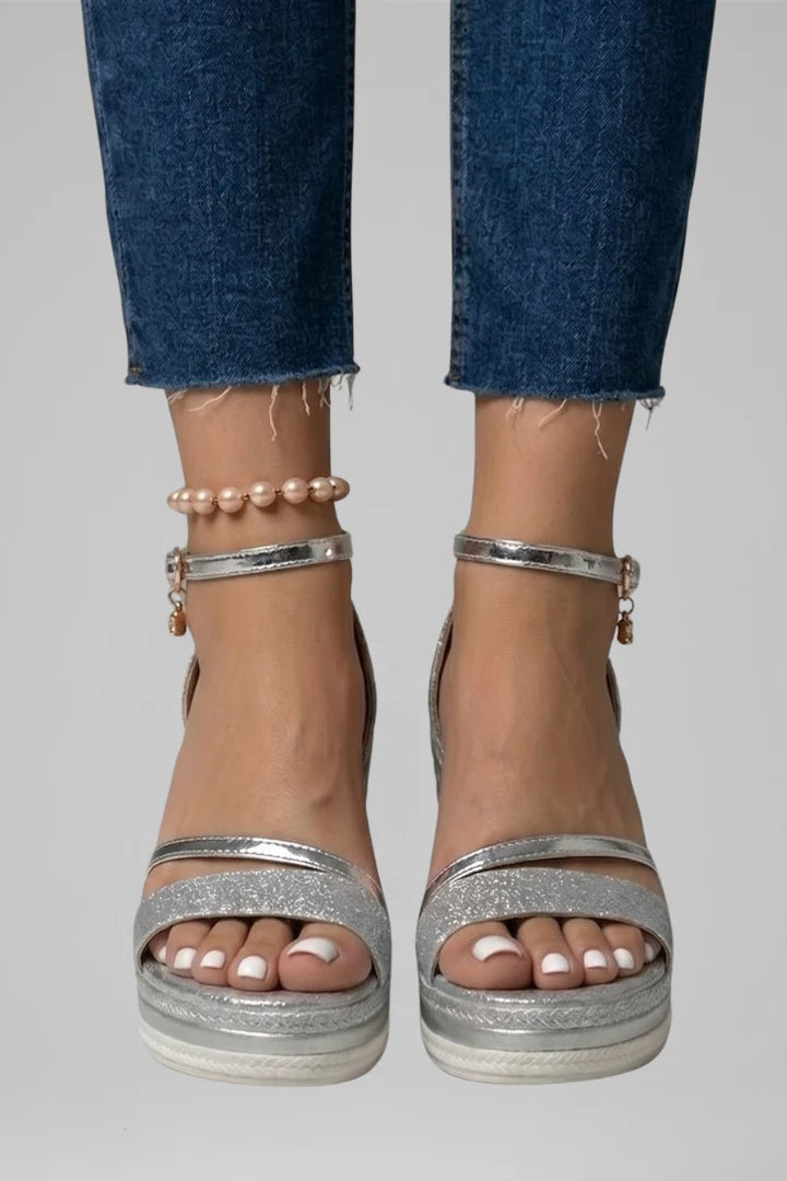 Textured finish wedge sandals with ankle strap and contrast sole detailing for summer wear