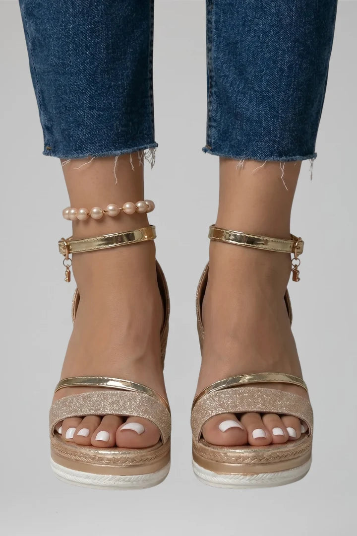 Women's platform wedge sandals in black with adjustable ankle strap and open-toe silhouette