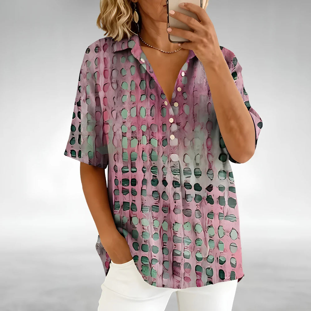 Close-up view of the Relaxed Comfort Top showing sheer textured fabric and button-front detail