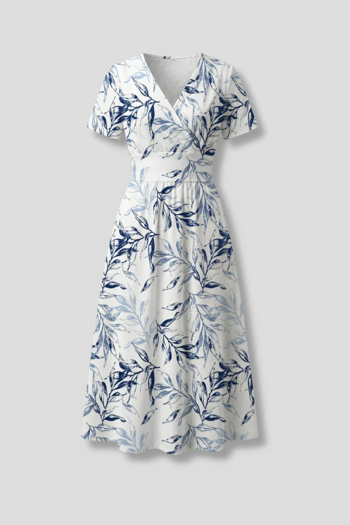 Women's Midi Dress with V Neckline and Floral Print featuring blue botanical pattern on white base with short sleeves