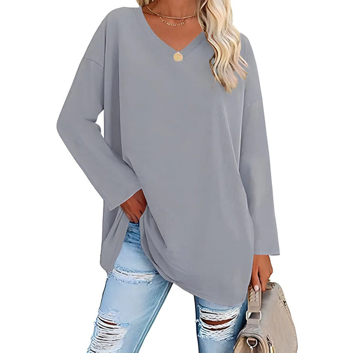 Women's V-Neck Long Sleeve Tunic in light blue and red colourways showing relaxed drape and tunic length coverage