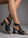 Sienna Braided Sandals With Geometric Heel For Comfort shown on model with sculpted block heel and woven upper