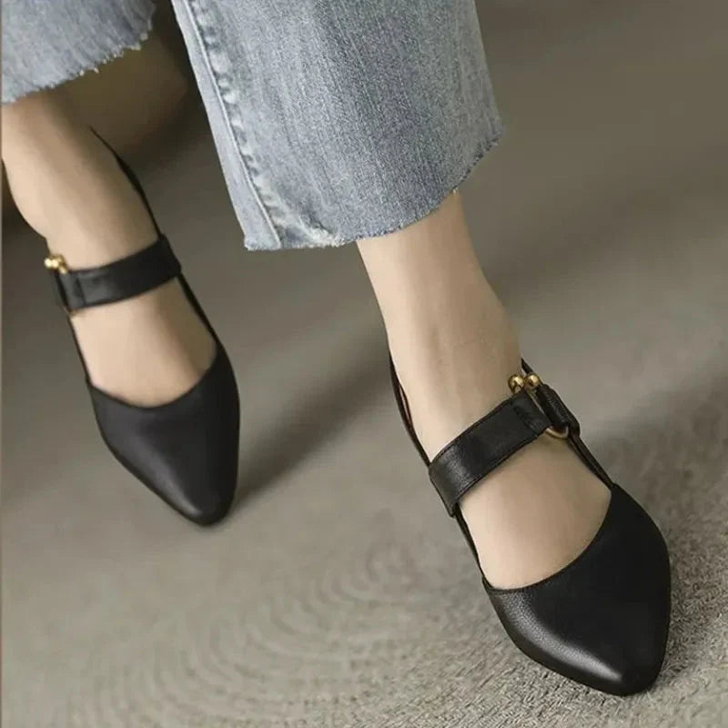 Black heels elegant block heel design with closed toe and ankle strap detail