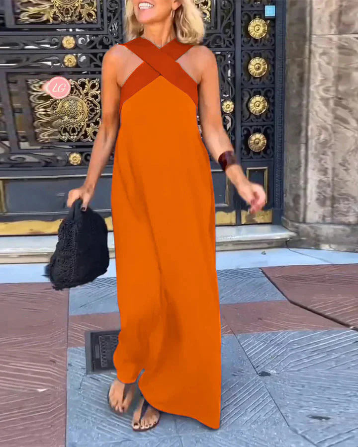 Full-length view of black halterneck maxi dress with contrasting taupe bodice trim