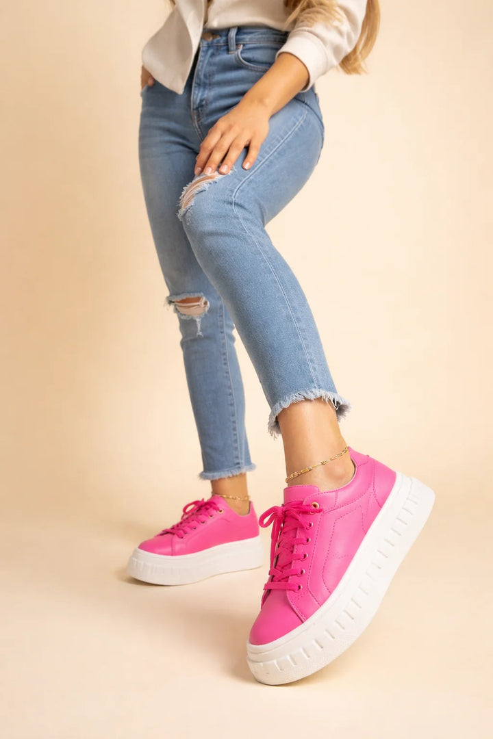 Detail shot of chunky platform sole on women's comfort sneakers with textured base