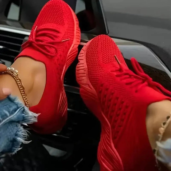 Women's Orthopedic Lightweight Walking Sneakers in vibrant red with breathable mesh upper and flexible sole for all-day comfort