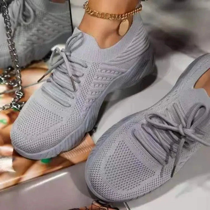 Detailed view of breathable mesh upper on orthopedic walking sneakers with ergonomic footbed for pressure reduction